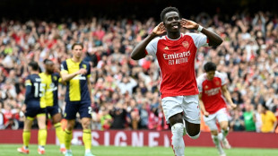 Arsenal sink Bournemouth to move four points clear in title race