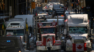 'Hold the line': Canada truckers dig in despite new police powers