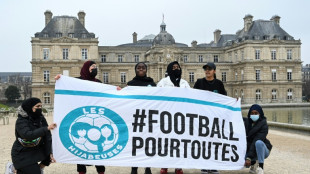 French minister condemns headscarf ban for Muslim footballers