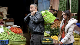 Tunisians fear more economic pain as IMF talks loom