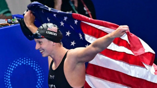 Ledecky wins 22nd world title as Popovici savours 'scary' gold  