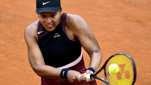 Osaka wins in Rome after three-year absence