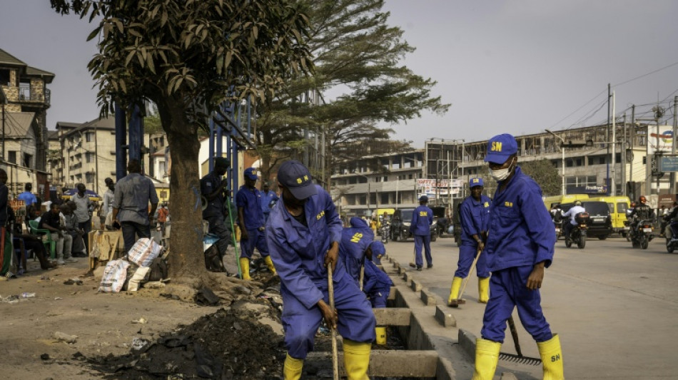 In DR Congo streets, ex-hoods get tough on litter -- and locals