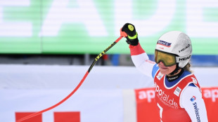 Suter wins Garmisch downhill in final Olympic tune-up