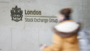 London stocks hit new record peak on takeovers