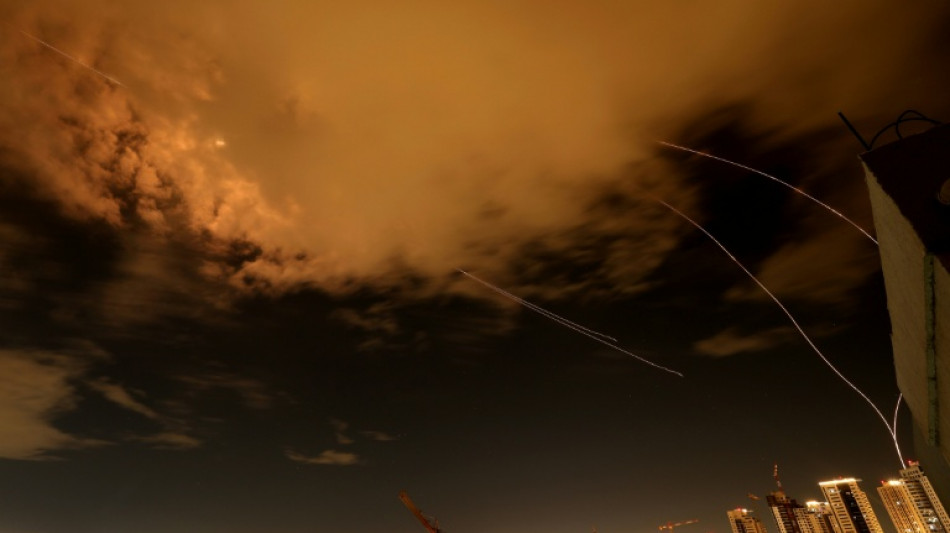 Iran, Israel trade strikes as diplomats work behind the scenes