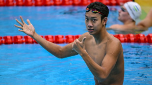 China swimmer in Asian Games first as North Korea lifters reign