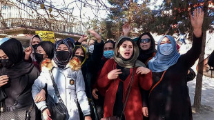 Afghan women banned from university 'for not following dress code'