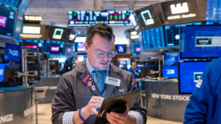 Wall Street termine mitigée, le Nasdaq sur un record