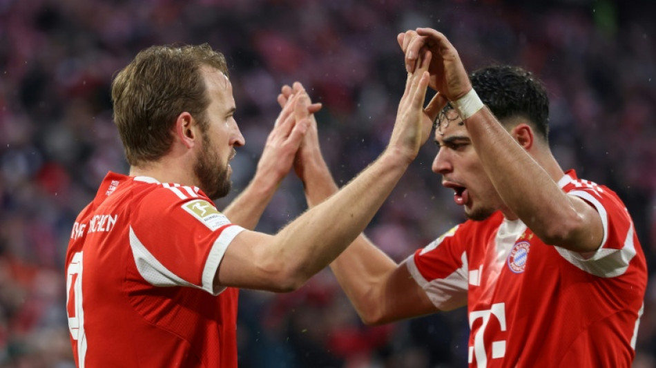 Kane helps Bayern extend Bundesliga lead as Dortmund held by Leipzig