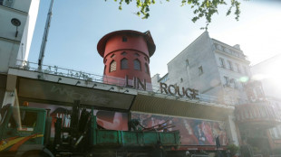 Paris landmark Moulin Rouge's windmill sails collapse