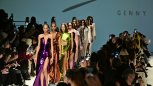 'Sunglasses hide tears' as show goes on at Milan Fashion Week
