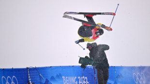 Cameraman becomes 'cushion' for freefalling Olympic freeskier