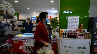 Beijing residents swamp supermarkets after lockdown rumours