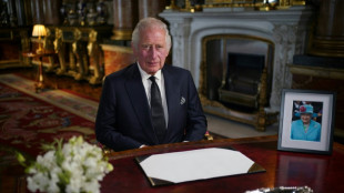 King Charles III vows 'lifelong service' as crowds mourn queen
