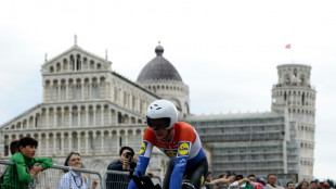 Del Toro holds Giro lead as Hoole wins rainy time trial