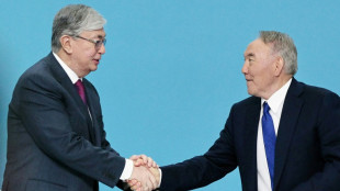 Kazakh president takes party leadership after sidelining mentor