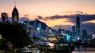 Stock markets mixed, yen firms as Japan PM vows to stay