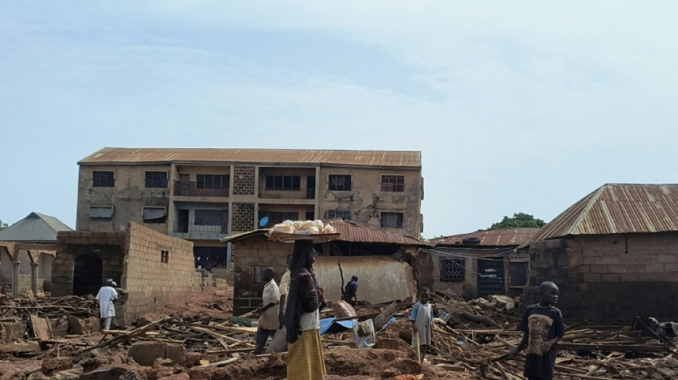 Nigeria flood victims mourn missing bodies as death toll stagnates