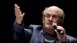 Salman Rushdie stabbed onstage, rushed to hospital