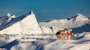 Greenland treads softly on tourism as icebergs melt