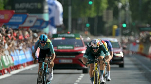 Van Aert claims shortened Vuelta stage 15 win in high heat
