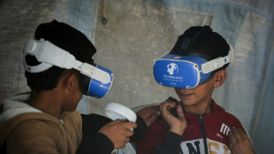 VR headsets take war-scarred children to world away from Gaza