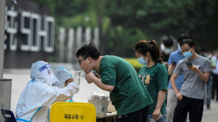 Beijing delays school reopenings after new Covid outbreak