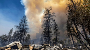 California wildfire rages as US bakes in record-setting heat wave