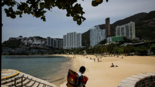 Hong Kongers relish beaches reopening as virus outbreak recedes