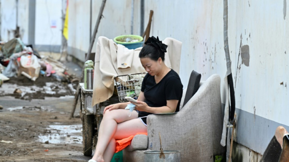 Beijing lifts rain alert after tens of thousands evacuated