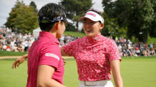 History-making Japan golf twins push each other to greater heights