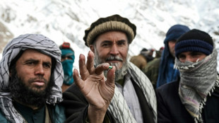 Ex-government workers mine for salvation in Afghan mountains