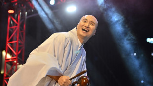 S. Korea 'monk' DJ ditches robe to avoid Singapore ban