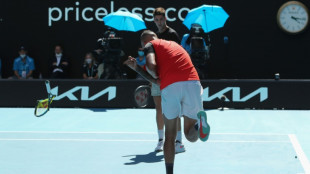 Kyrgios smashes racquet, flips finger as he reaches doubles final