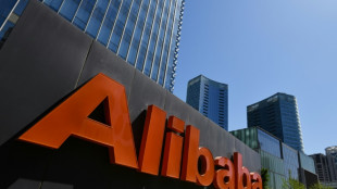 Alibaba says profit fell 74% in 'volatile' environment