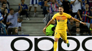 Barca 'get rid of ghosts' with important win at Porto
