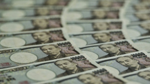 Yen slides to fresh 34-year low against dollar, stocks rally