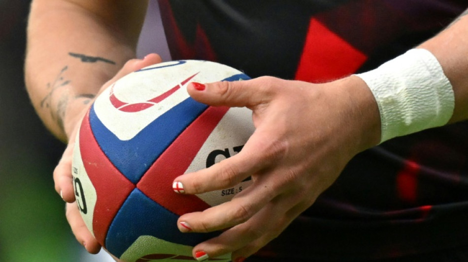 England's Hassell-Collins dazzles with nail polish against Italy 