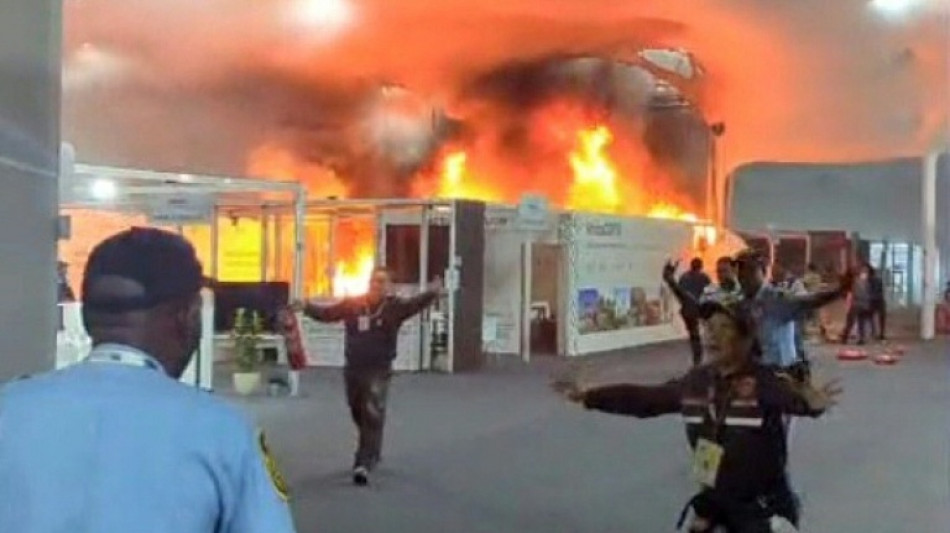 Fire breaks out at UN climate talks, forcing delay at critical phase