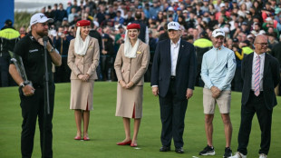 Trump watches as Lowry wins Irish Open in record-breaking style