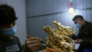 Au Vietnam, des figurines de tigre s'arrachent &agrave; prix d'or pour le Nouvel an lunaire