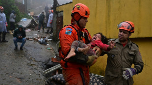 Brazil rescuers save girl after storm kills at least 12