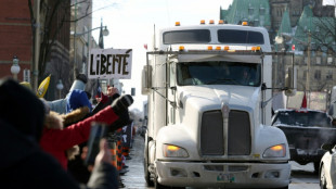Hundreds of truckers pour into Ottawa to protest vaccine requirements