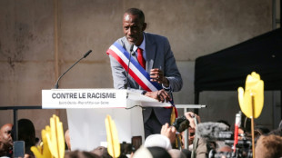 Thousands rally against racism in Paris suburb to defend mayor
