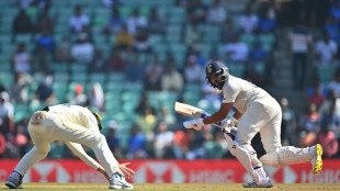 Murphy shines on debut, but Rohit's ton puts India on top