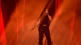 SZA and Swift win Grammys, as Tracy Chapman wows gala audience