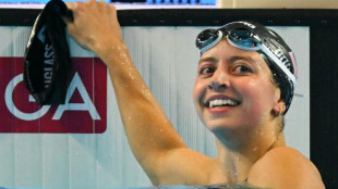 Douglass dedicates world gold to stricken US after 'rough' week